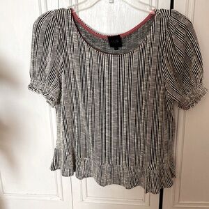 Short sleeve rayon top with ruffle bottom  very slimming